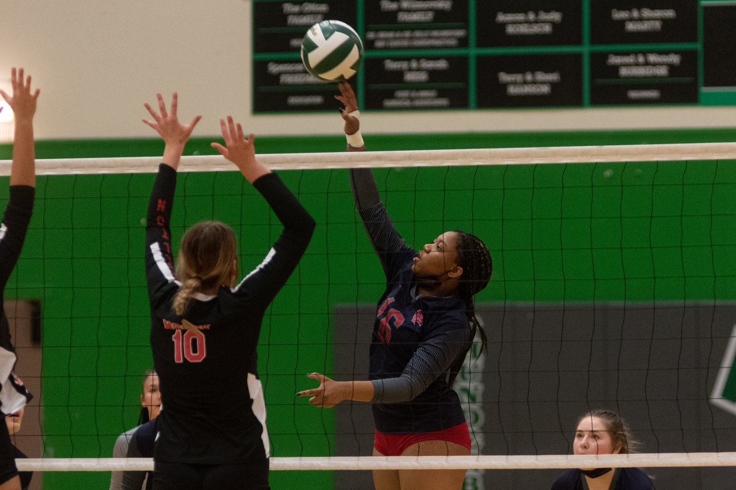 Black Hills outside hitter  Raeven Medwynter hits a spike across the net in a consolation bracket matchup against Shelton in the 2A District 4 tournament Nov. 11.