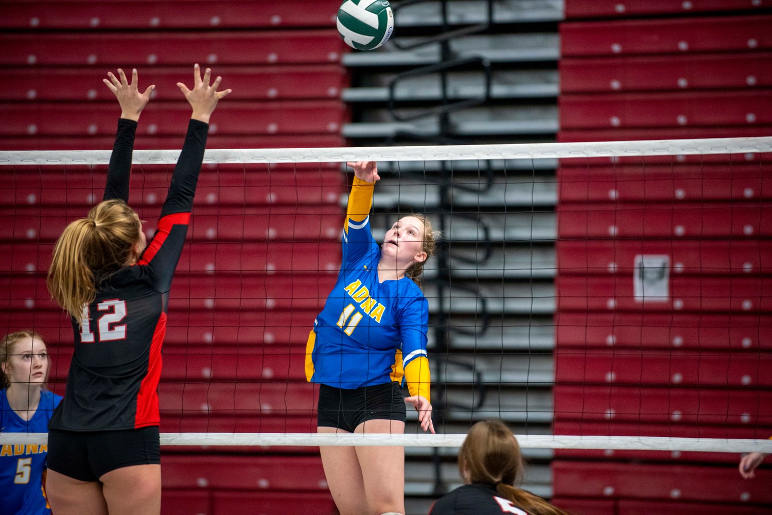 Adna’s Kendall Humphrey (11) spikes against Liberty (Spangle) in the 2B 7th/8th-place match Friday in Yakima.