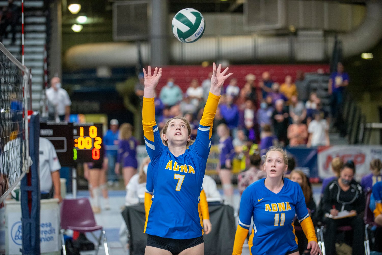 Adna’s Parker Feist (7) sets the ball against Liberty (Spangle) in the 2B 7th/8th-place match Friday in Yakima.