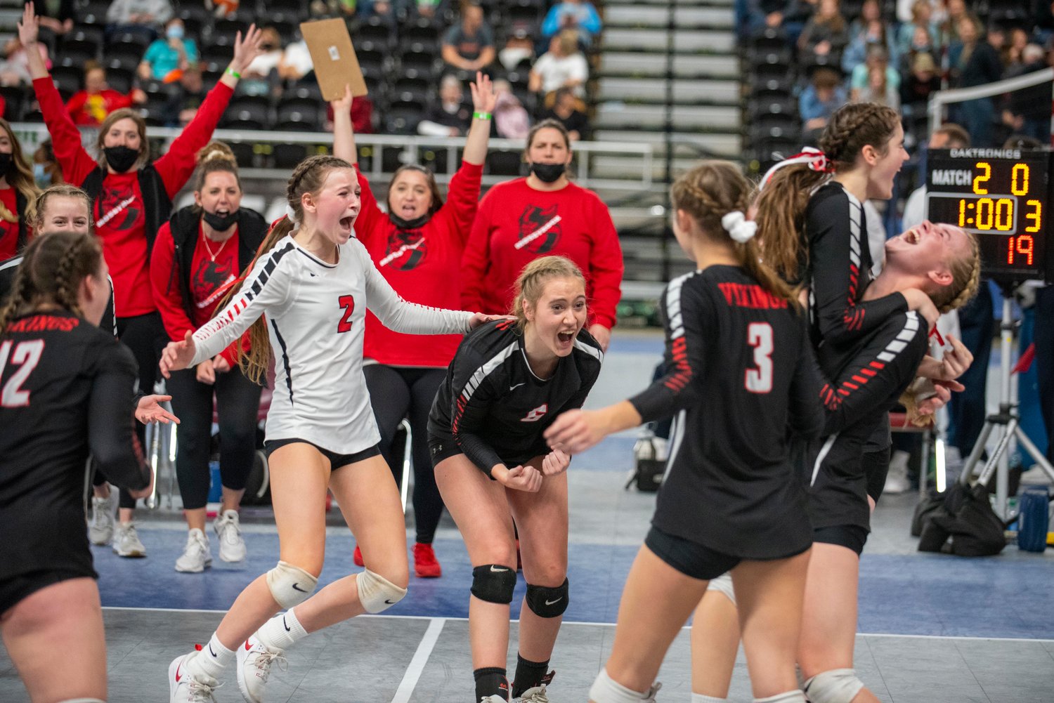 Mossyrock celebrates after sweeping St. John Endicott/LaCross in the 1B state semifinals Friday in Yakima.