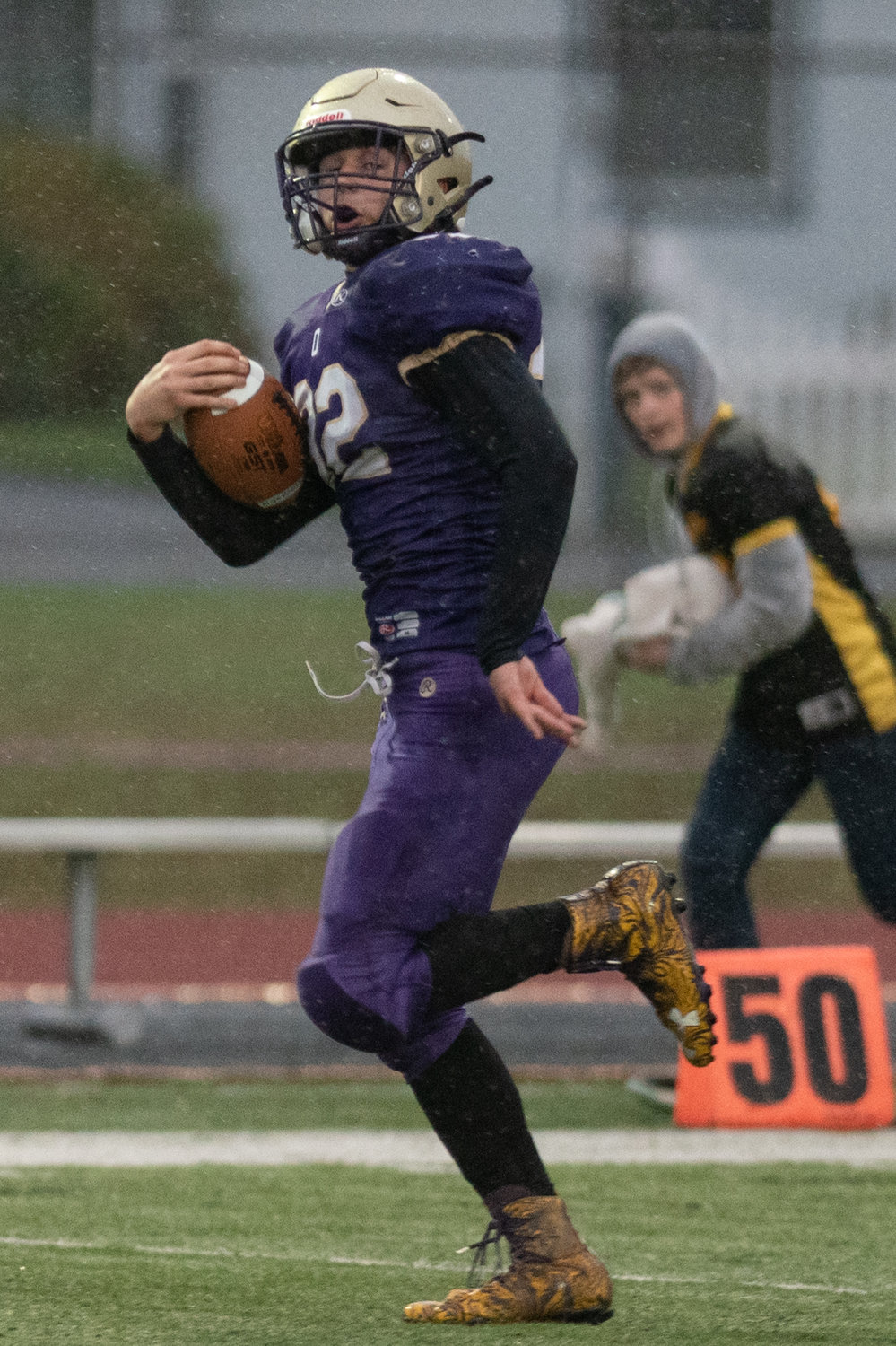 Onalaska fullback Marshall Haight looks back as he races toward the end zone against River View in the opening round of the 2B state tournament at Centralia Tigers Stadium Nov. 13.
