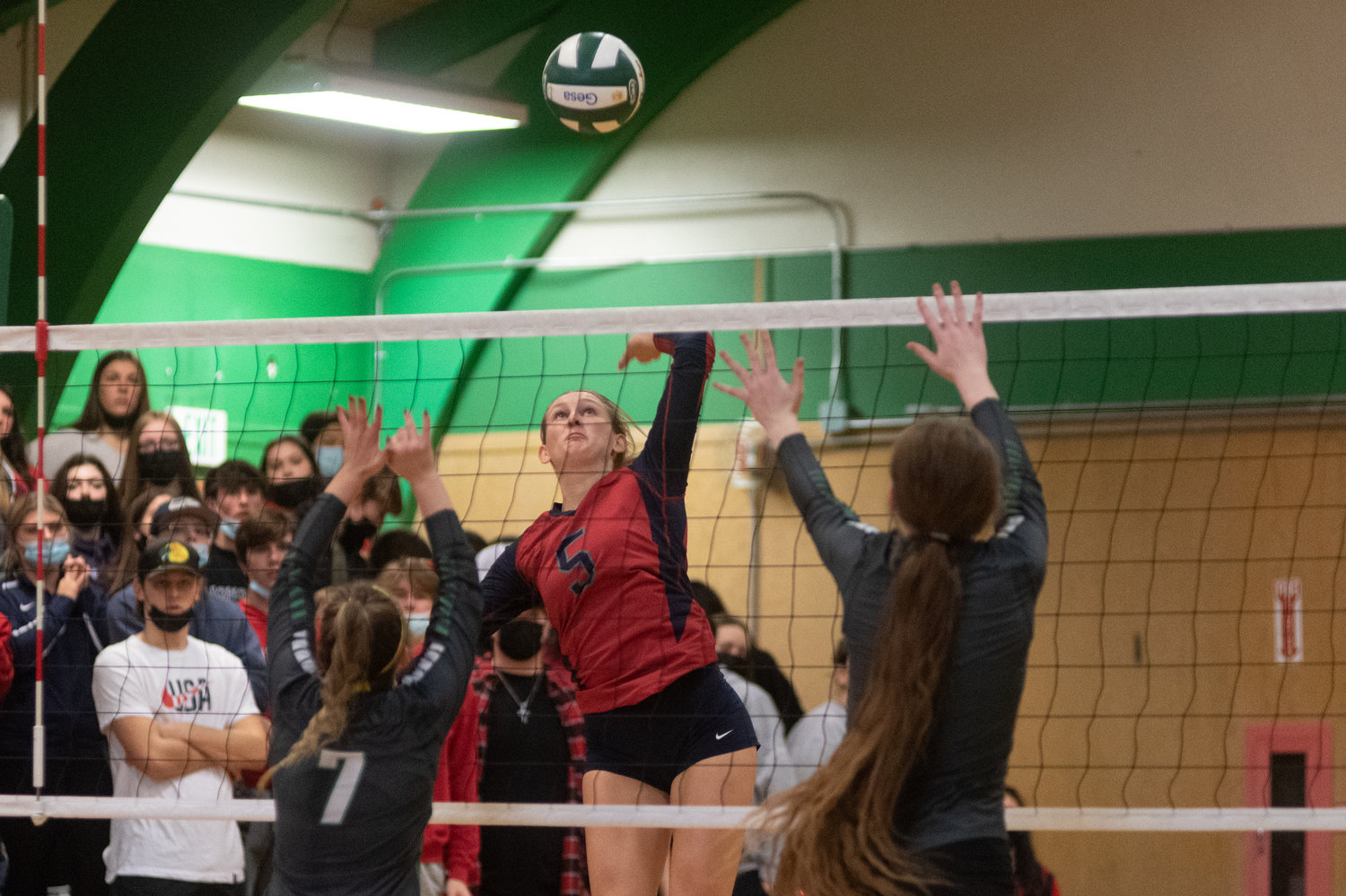 Black Hills outside hitter Olivia Hisaw goes up for a kill against Tumwater in the district playoffs Nov. 13.