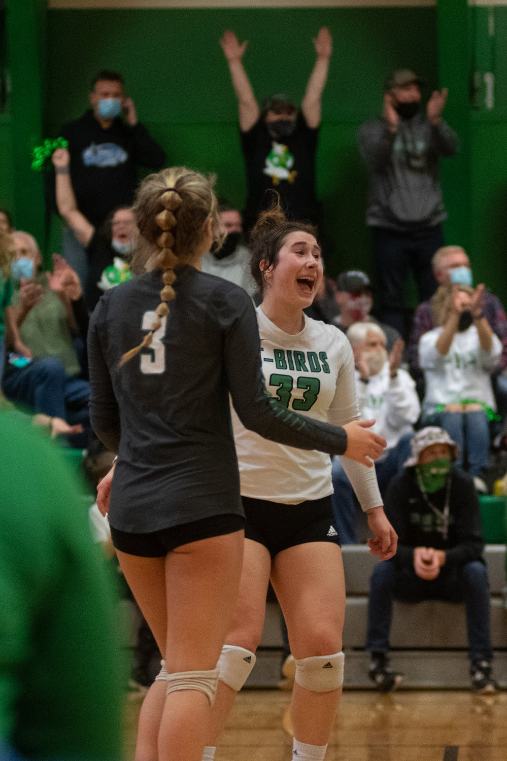 Two Tumwater players celebrate a point against Black Hills in the district playoffs Nov. 13.
