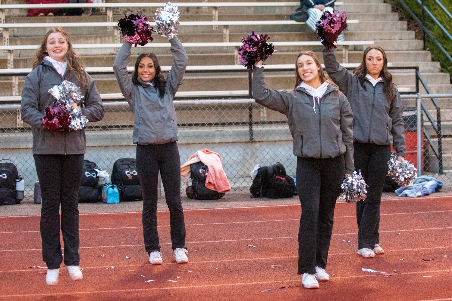 W.F. West’s cheerleaders cheer on the Bearcats during a state playoff match against Prosser on Saturday.