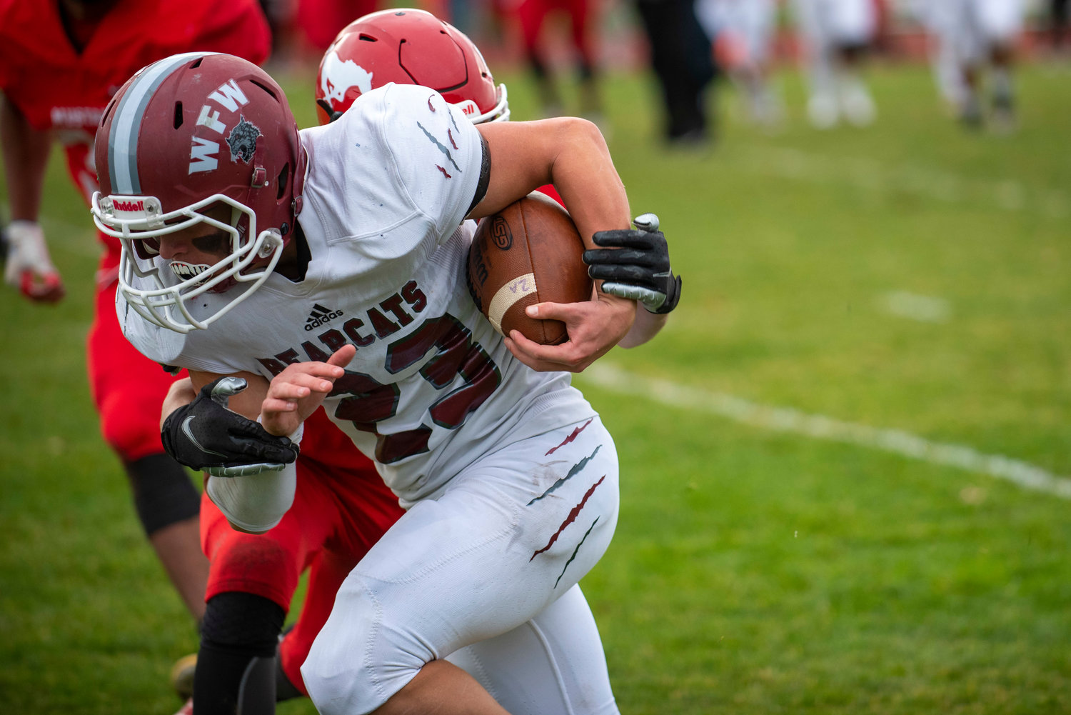 W.F. West’s Evan Stajduhar (23) runs after catching a pass against Prosser on Saturday.