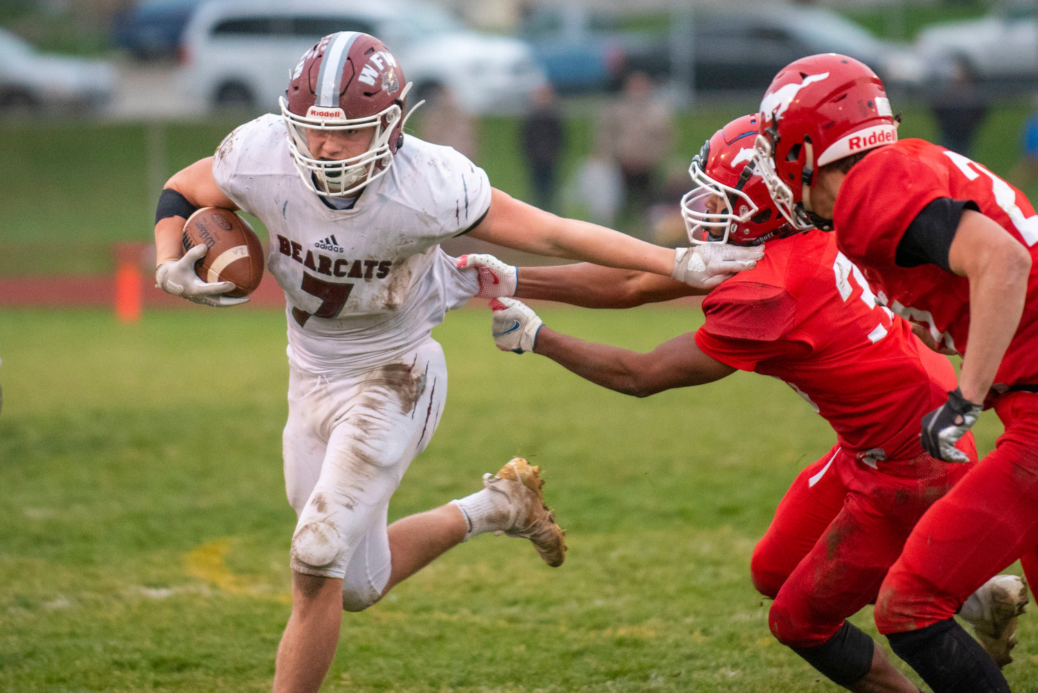 W.F. West’s Brock Guyette (7) escapes two Prosser defenders in a state playoff game Saturday.