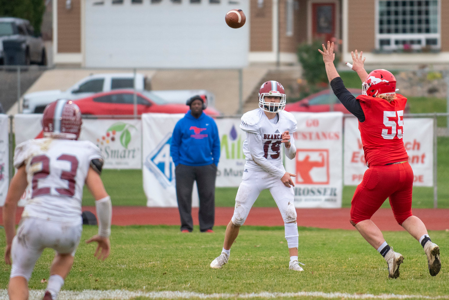 W.F. West QB Gage Brumfield (19) tosses a pass to Evan Stajduhar (23) against Prosser on Saturday.