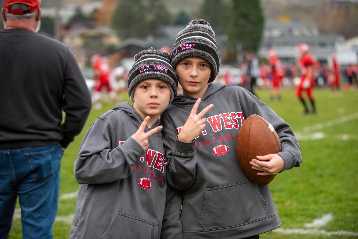 W.F. West’s ball boys pose for a photo during the Bearcats’ state playoff game against Prosser on Saturday.