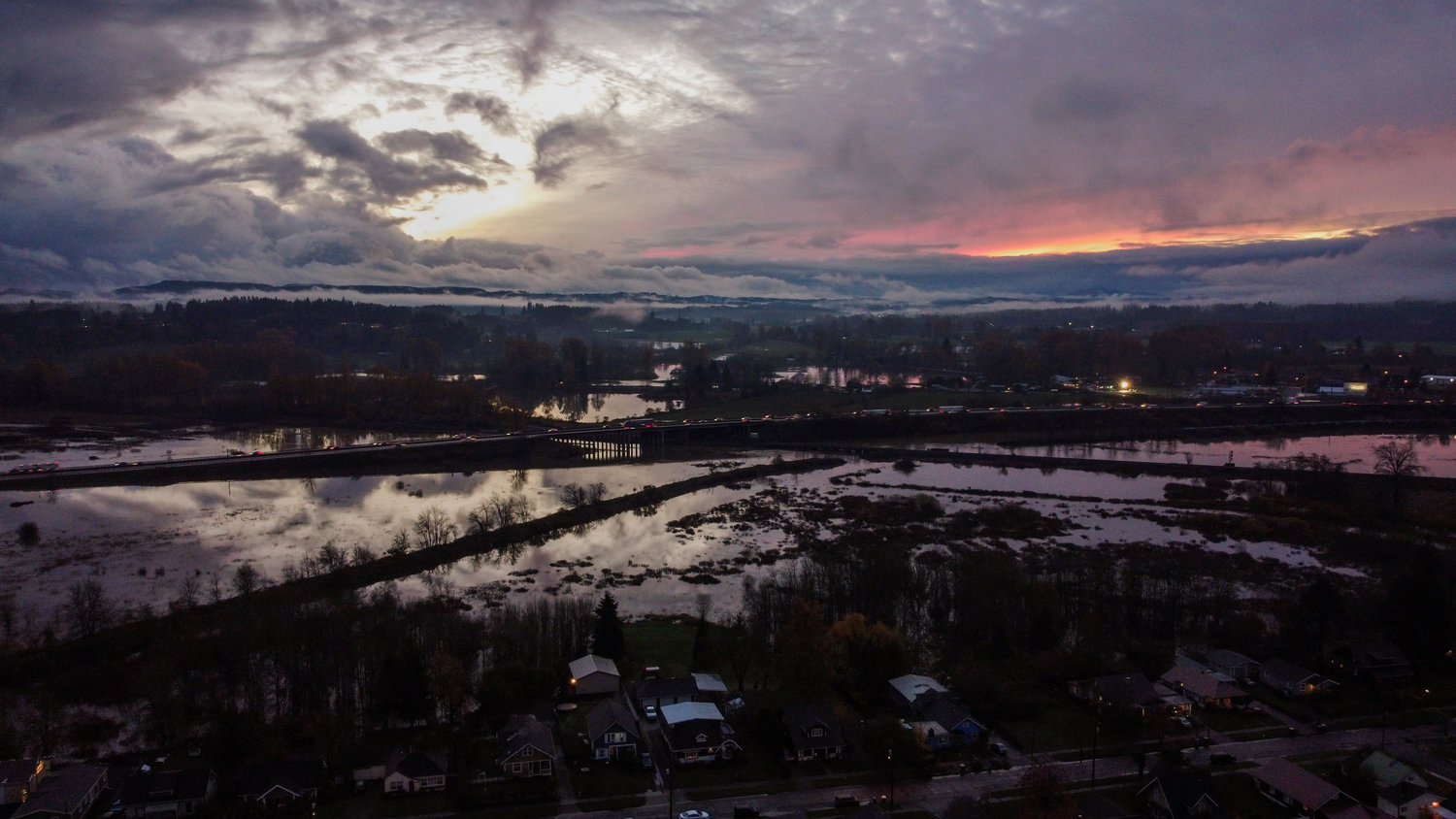 Interstate 5 and Chehalis are pictured from above the hillside at sunset Friday.