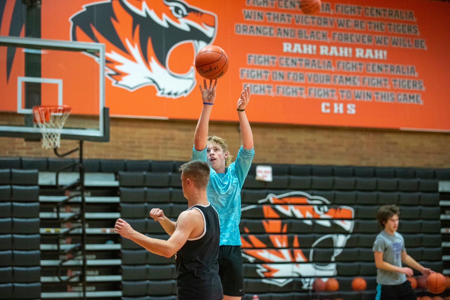Centralia's Landon Jenkins shoots in front of Brady Sprague during practice Tuesday.