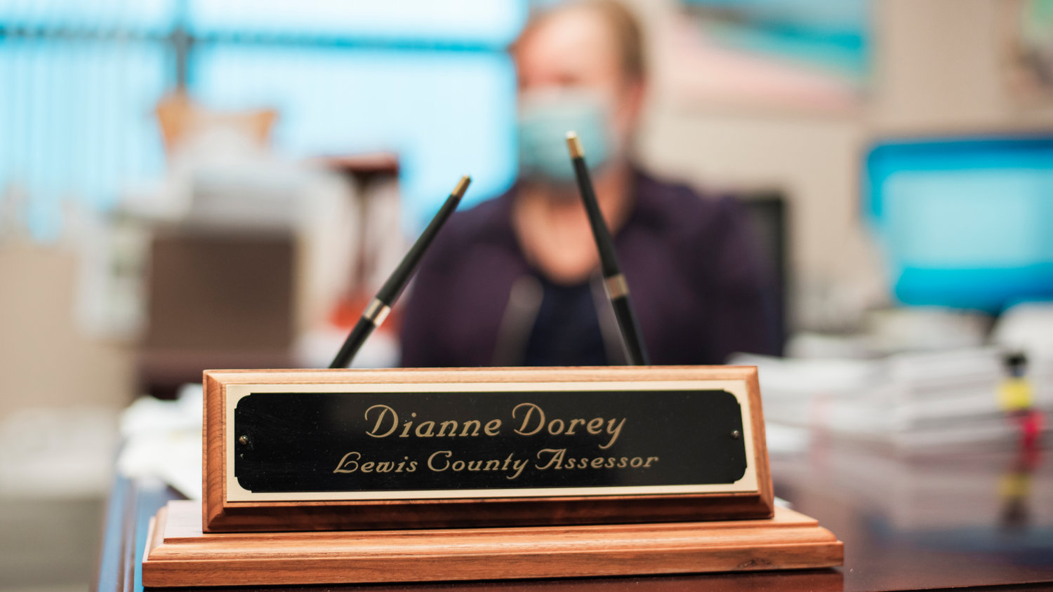 A name plaque reads "Dianne Dorey Lewis County Assessor" at the Lewis County Courthouse.