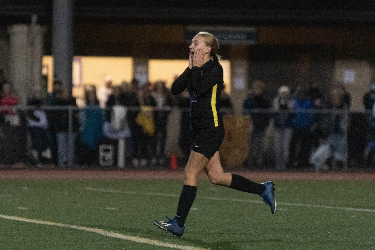 Adna's Lilly Wellander runs back after making a penalty kick in the Pirates win over Toledo in the 2B state semifinals Nov. 19.