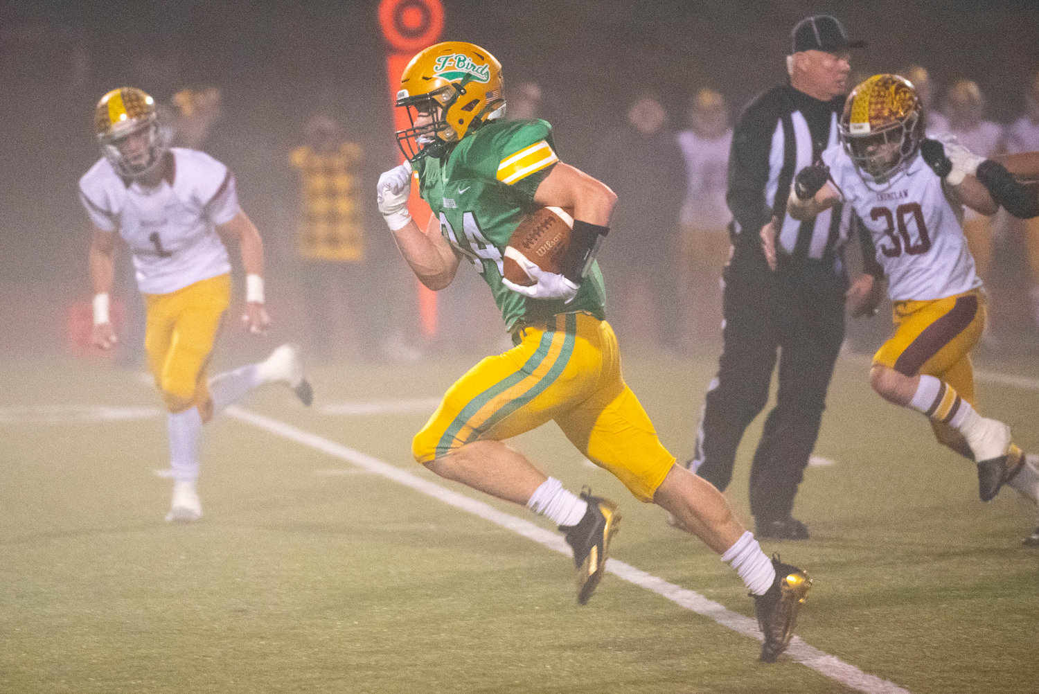 Tumwater’s Payton Hoyt takes off on a punt return against Enumclaw Nov. 19.