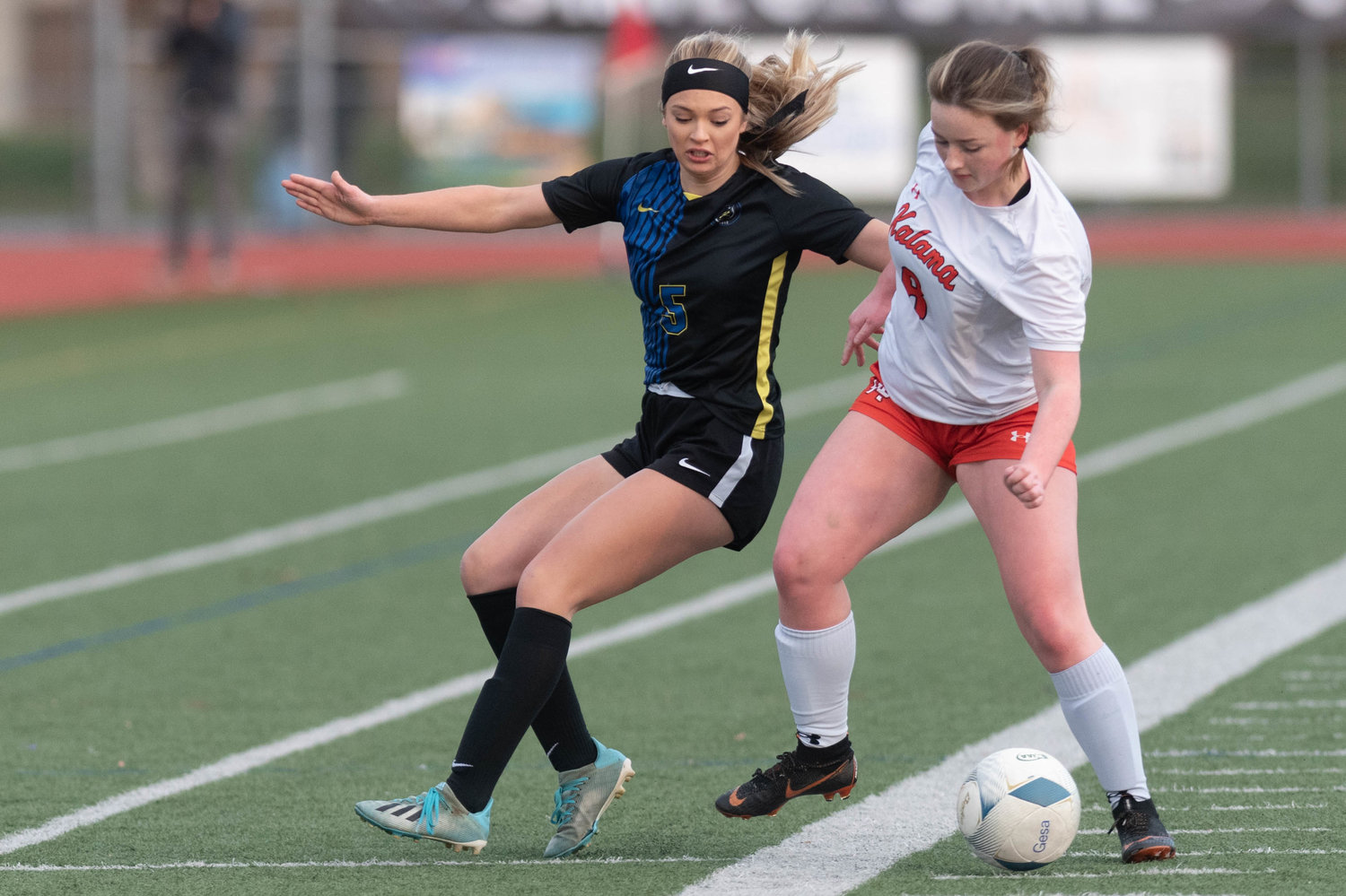 Adna's Kaylin Todd defends a Kalama player in the 2B state title game at Sunset Stadium Nov. 20.