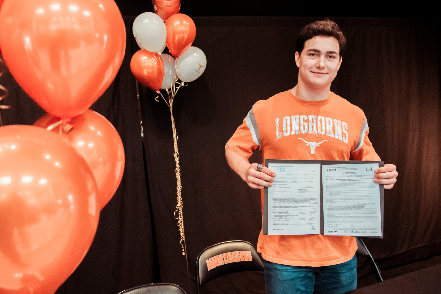 Jeremiah Nubbe poses for a photo after he signed with the University of Texas earlier this month.