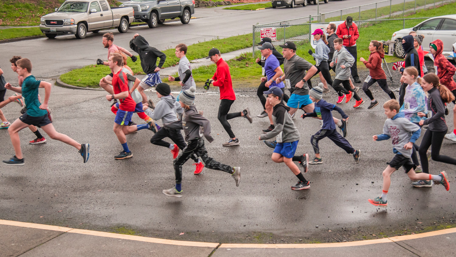 Runners launch from the Chehalis Thorbeckes during a Turkey Trot 5Kon Thanksgiving Day.