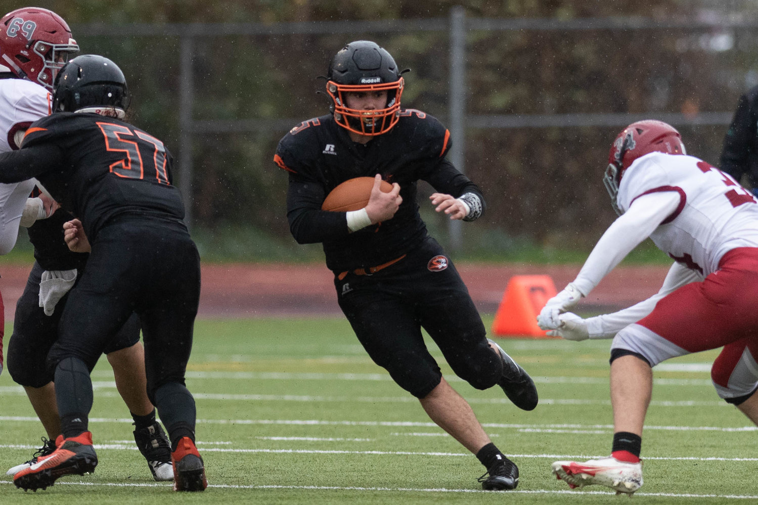 Napavine tailback Gavin Parker takes a carry for a big gain against Okanogan in the 2B state semis at Tumwater Nov. 27.