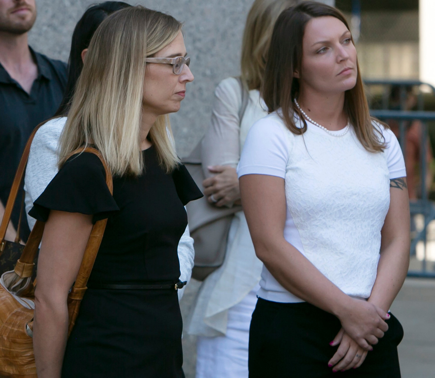 Annie Farmer, left, and Courtney Wild, right, who claimed they were molested by Jeffrey Epstein when they were teenagers, in a file photo from July 2019. (Emily Michot/Miami Herald/TNS)