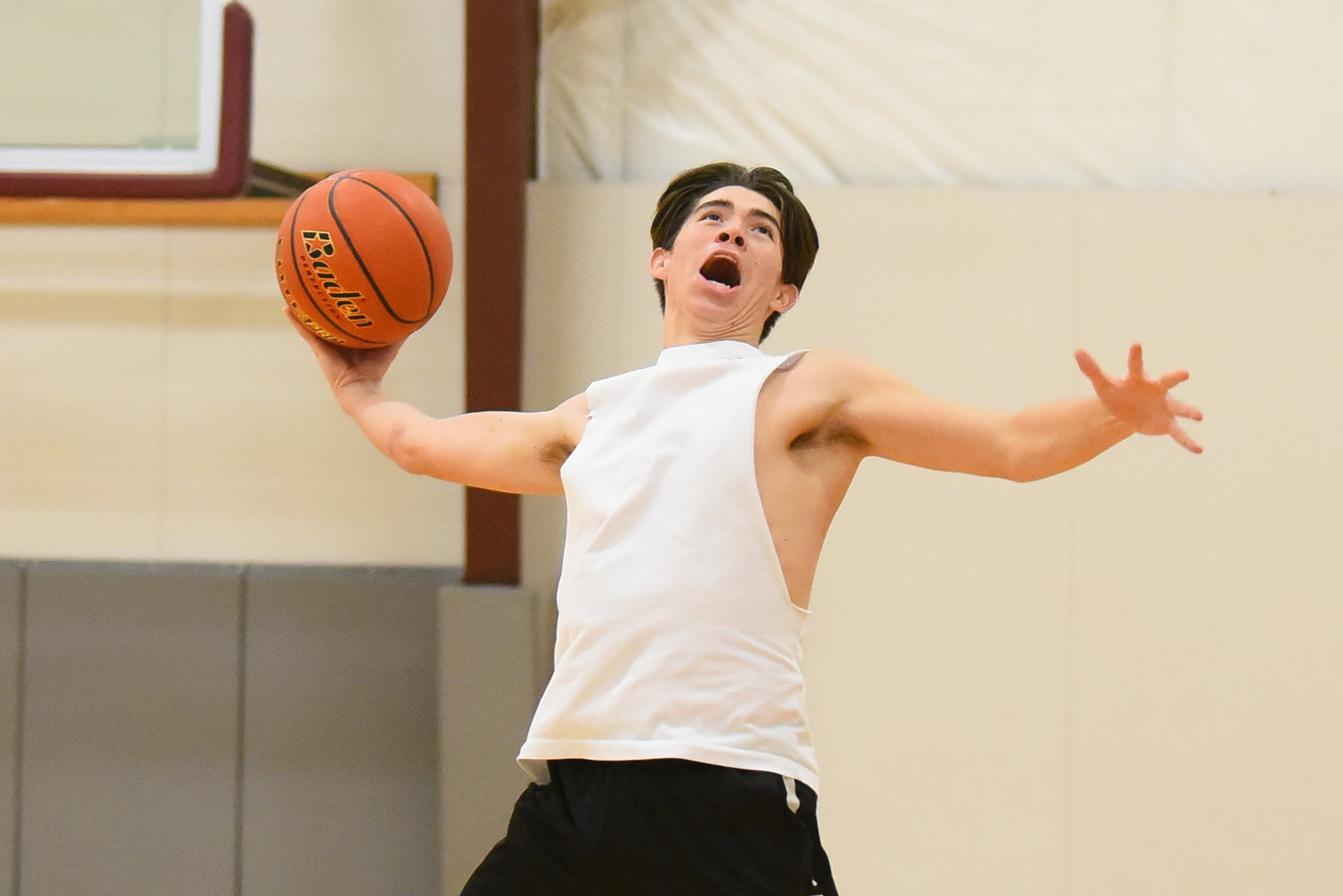 W.F. West's Cameron Amoroso flies through the air toward the hoops during practice Nov. 18.