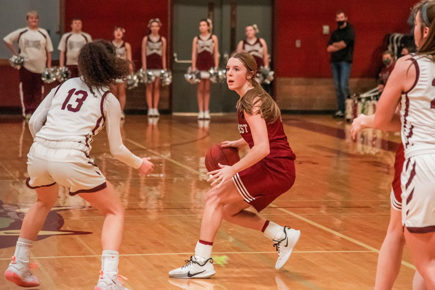 W.F. West’s Makayla Mencke (5) dribbles the basketball during a game in Montesano Tuesday night.