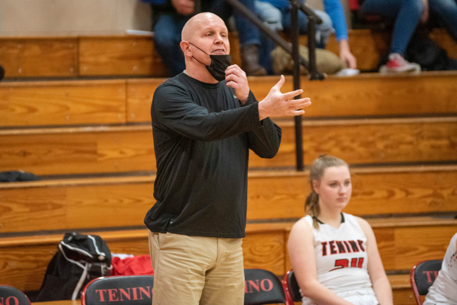 Tenino girls basketball coach Scott Ashmore calls out instructions to his team during their 2021-22 season opener against Rochester on Dec. 2, 2021.
