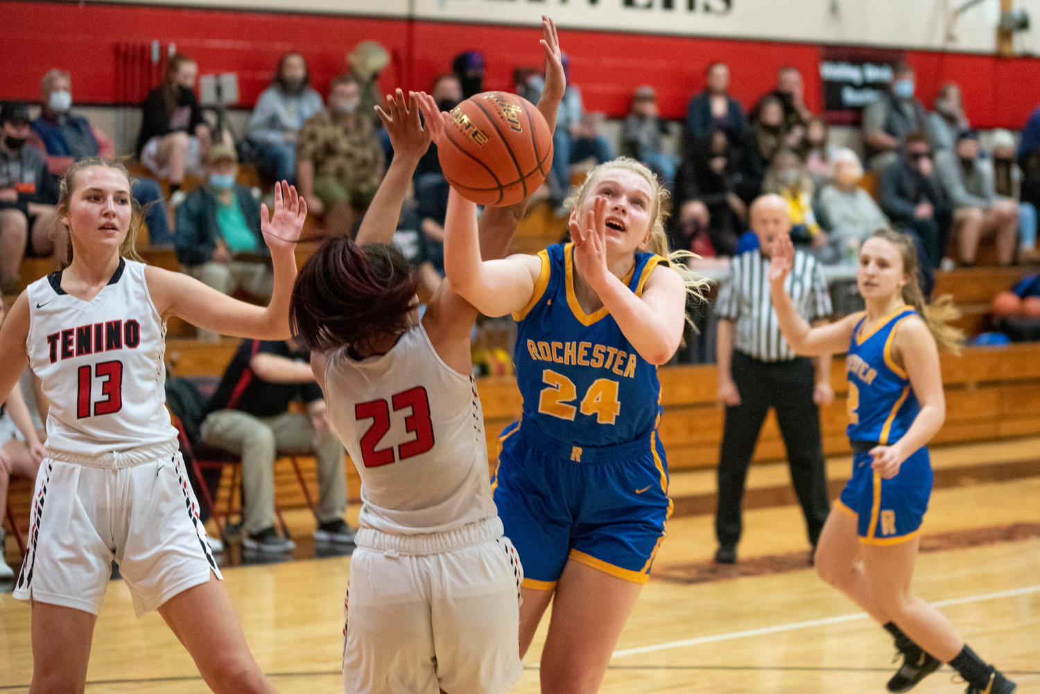 Rochester's Delany Winter (24) gets fouled shooting against Tenino on Dec. 2.