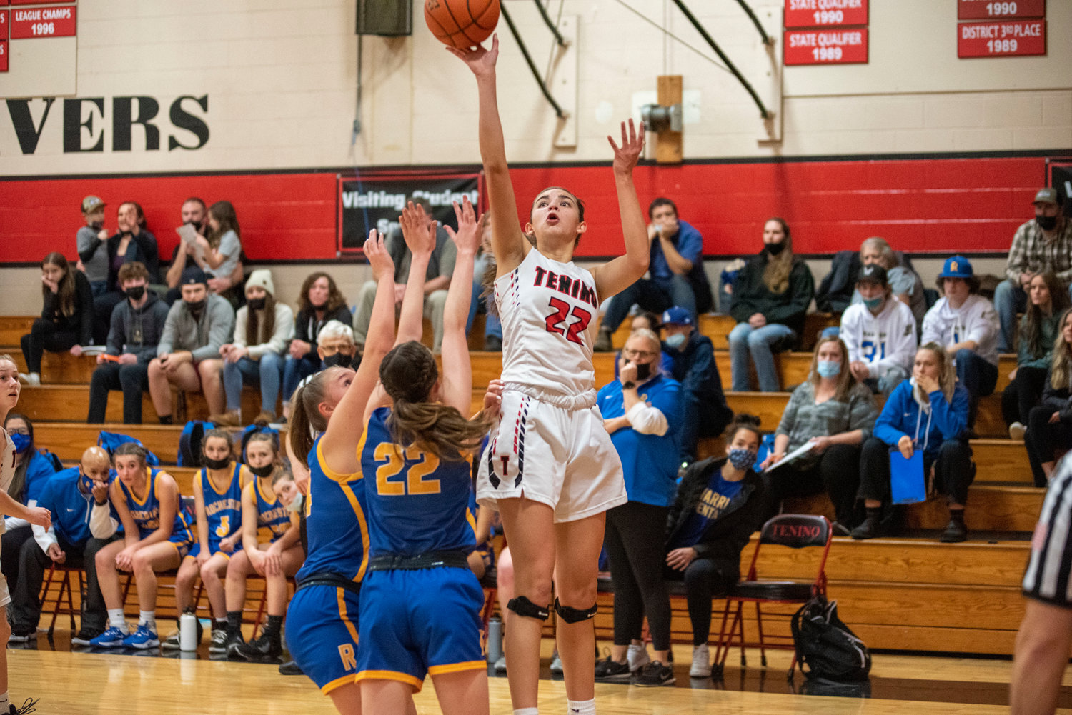 Tenino's Ashley Schow (22) shoots a 3-pointer against a Rochester double team on Dec. 2.
