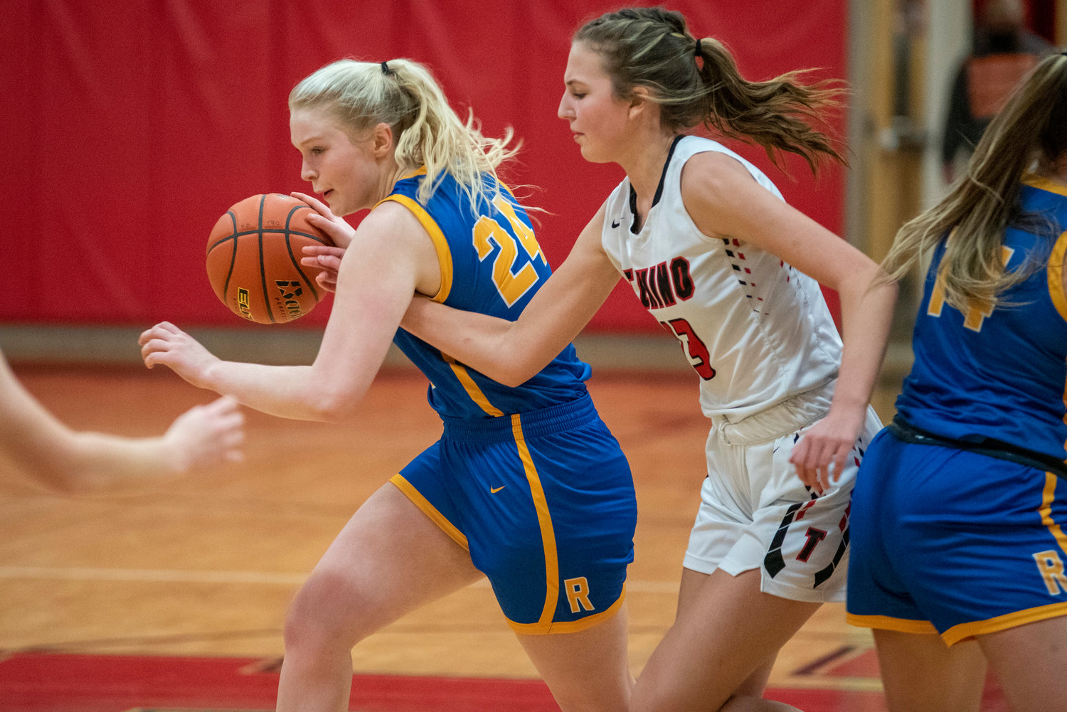 Rochester's Delany Winter (24) drives against Tenino on Dec. 2.