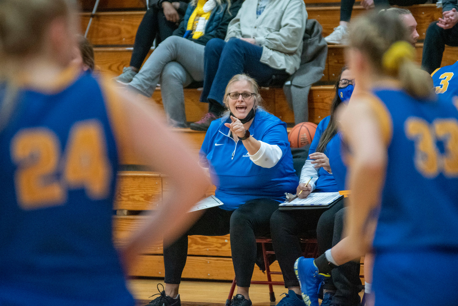 Rochester girls basketball coach Davina Serdahl calls out instructions to her team during a game against Tenino on Dec. 2, 2021.
