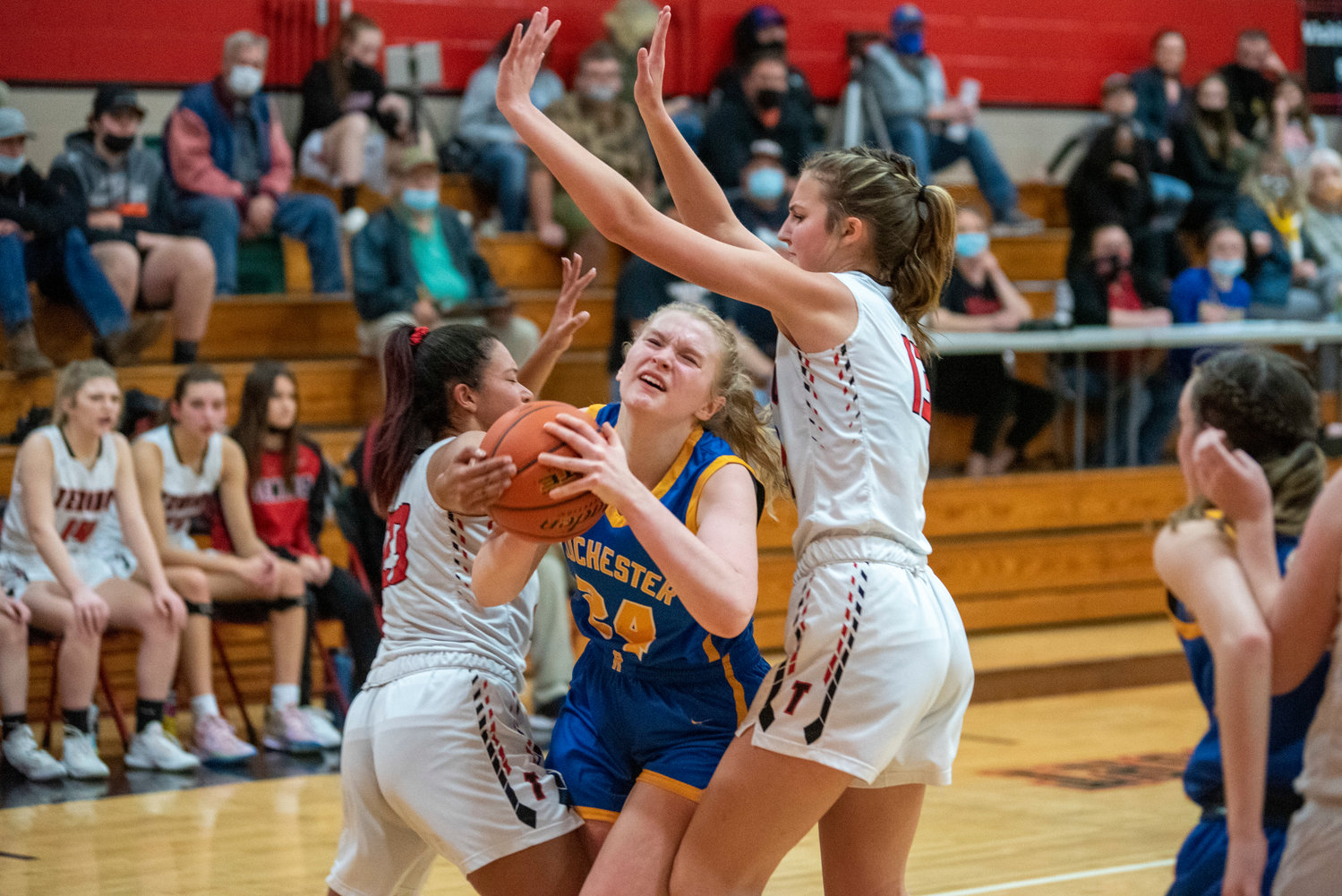 Rochester's Delany Winter (24) looks to drive through a Tenino double team on Dec. 2.