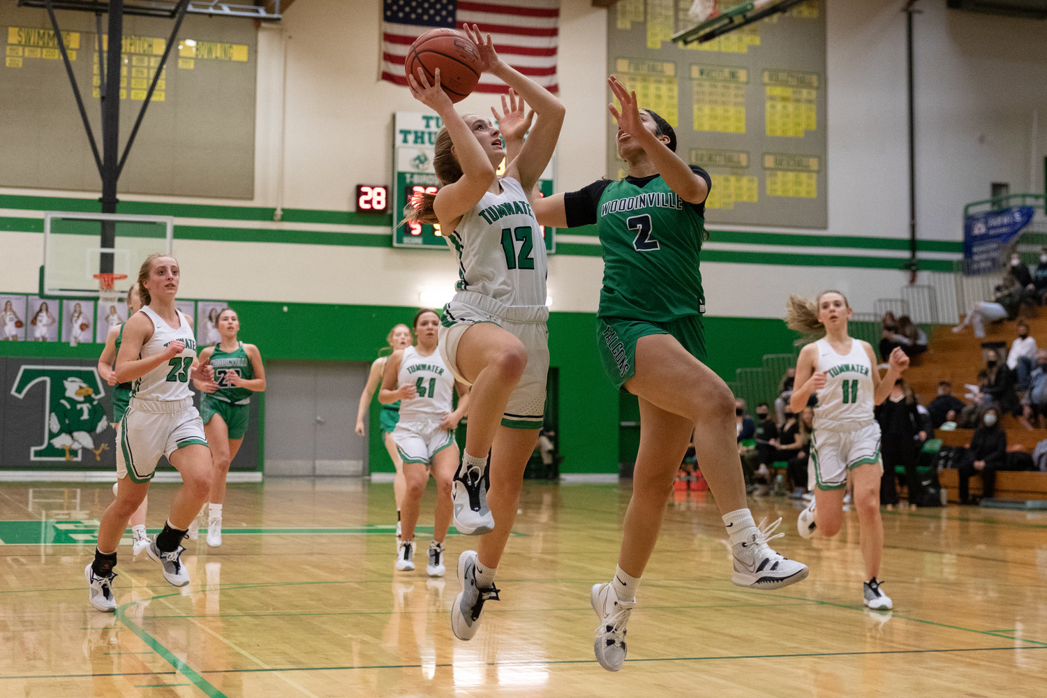 Tumwater guard Aubrey Amendala goes up for a fastbreak layup against Woodinville Dec. 2.
