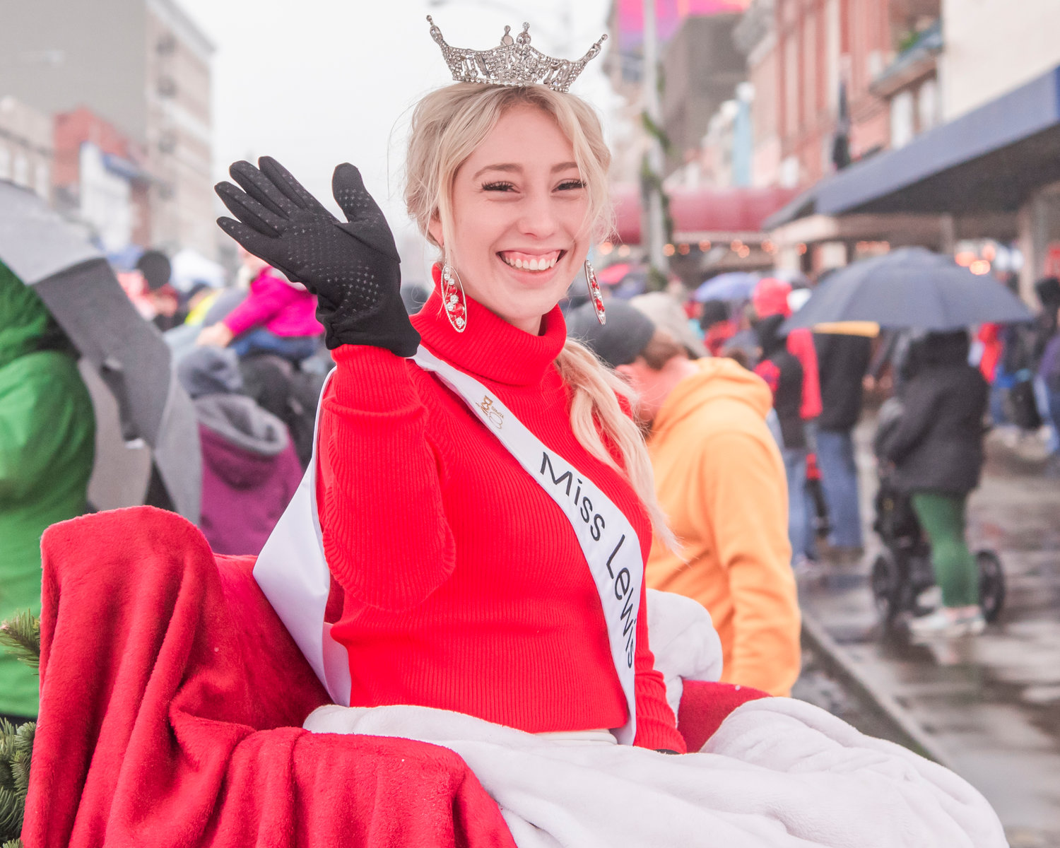 FILE PHOTO — Miss Lewis County Sophie Moerke smiles and waves during the Santa Parade in downtown Chehalis.