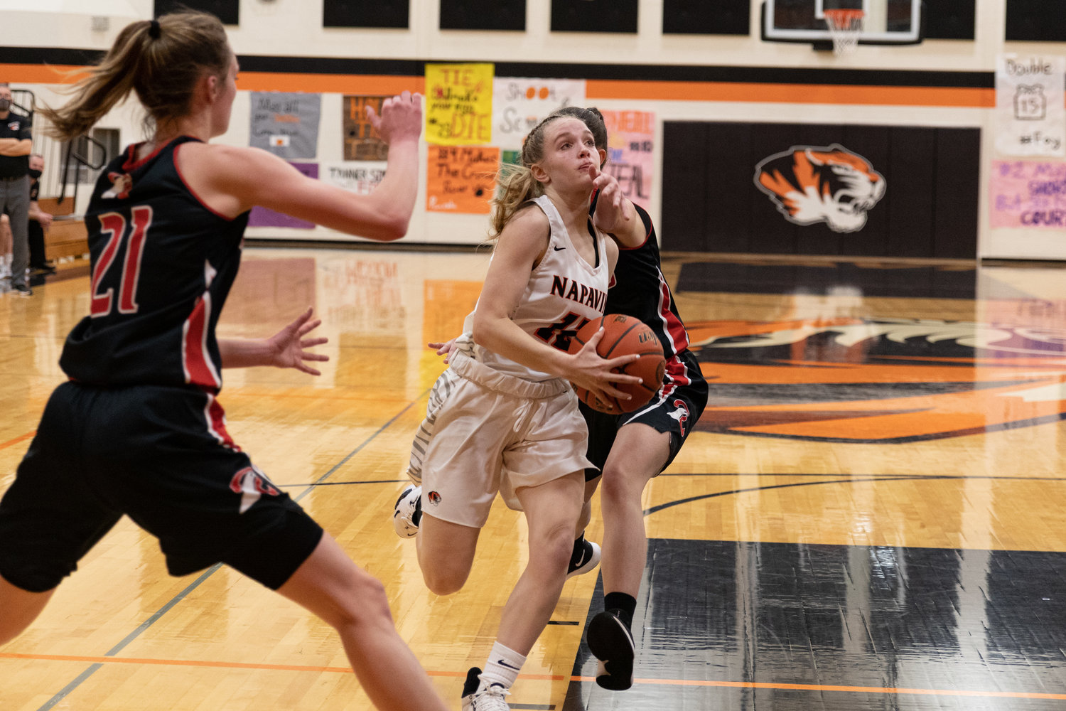 Napavine guard Avery Schutz is fouled while driving for a layup against Raymond Dec. 7.