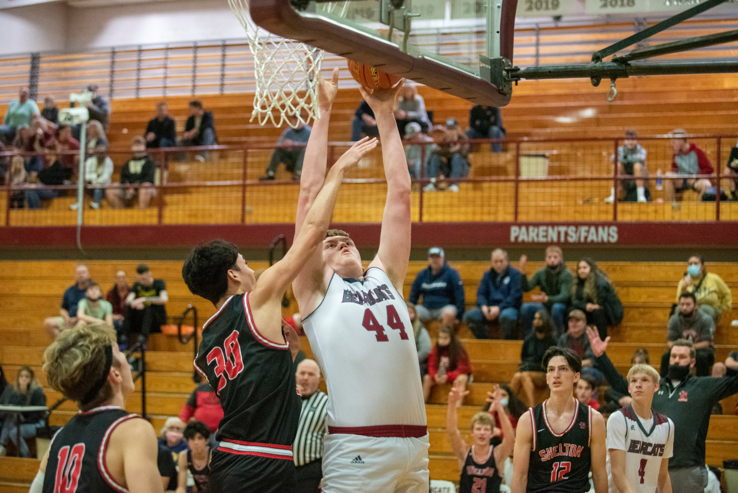 W.F. West's Soren Dalan (44) goes up for two points against Shelton's Matai Lei Sam (30) on Dec. 8.