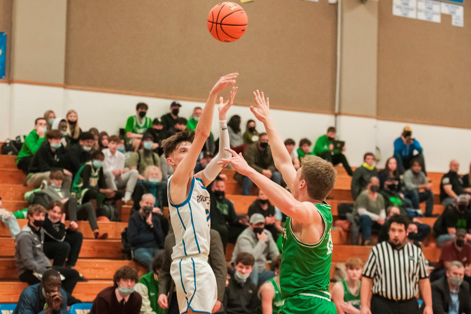 Rochester’s Tyler Klatush (2) shoots a three-point shot during a game Wednesday night against Tumwater.