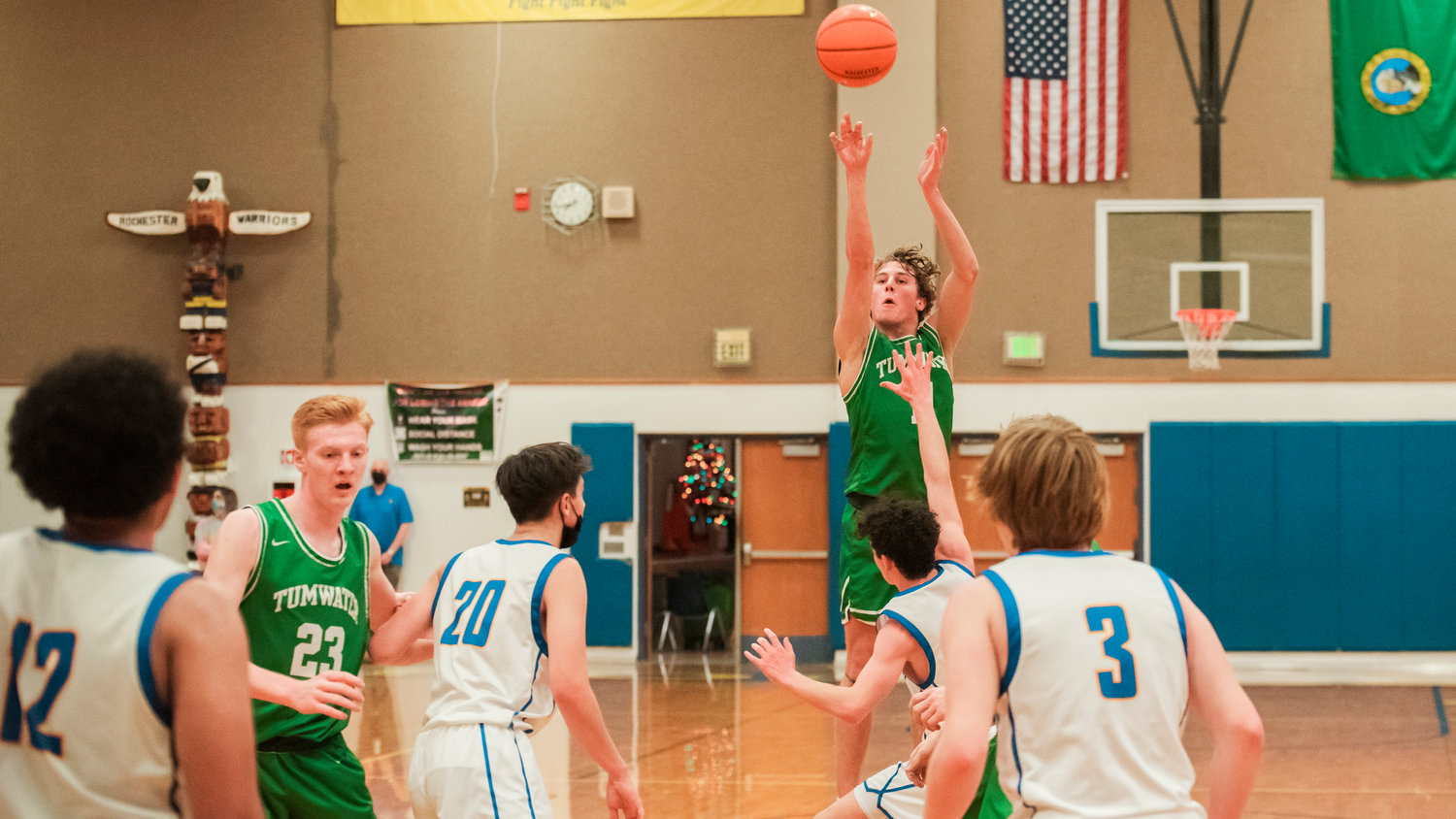 Tumwater’s Luke Brewer (11) makes a three-point shot during a game against Rochester Wednesday night.