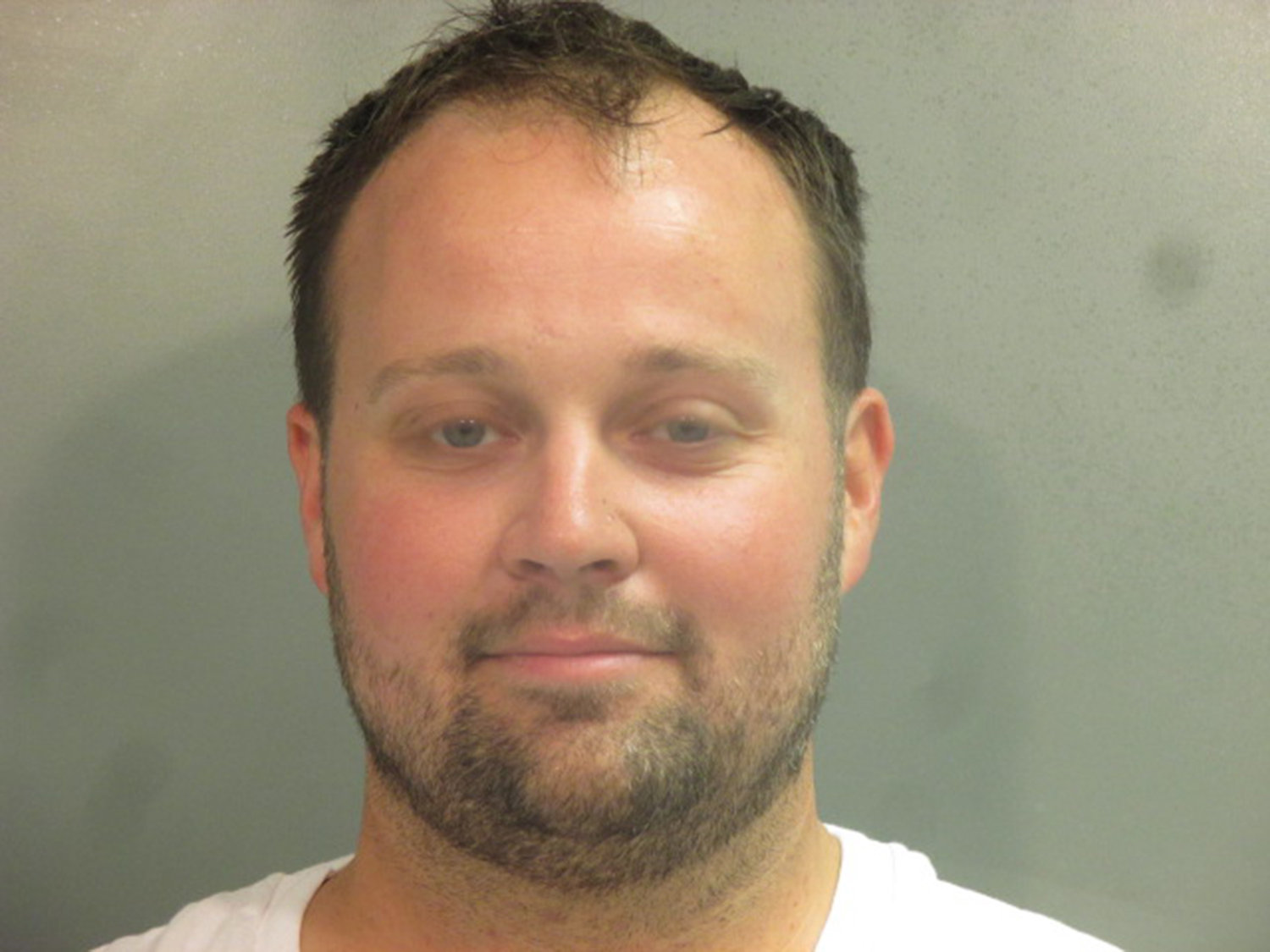 In this handout photo provided by the Washington County Sheriff's Office, former television personality on "19 Kids and Counting" Josh Duggar poses for a booking photo after his arrest on April 29, 2021, in Fayetteville, Arkansas. Duggar was convicted Thursday at his child pornography trial. (Washington County Sheriff's Office via Getty Images/TNS)