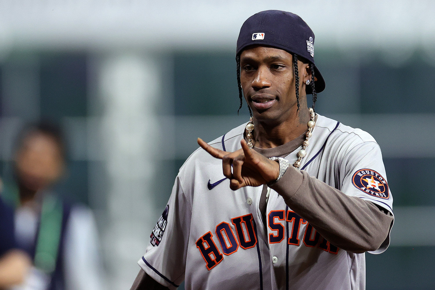 Rapper Travis Scott announces "play ball" prior to Game 6 of the World Series between the Houston Astros and the Atlanta Braves at Minute Maid Park on Nov. 2, 2021, in Houston. (Carmen Mandato/Getty Images/TNS)
