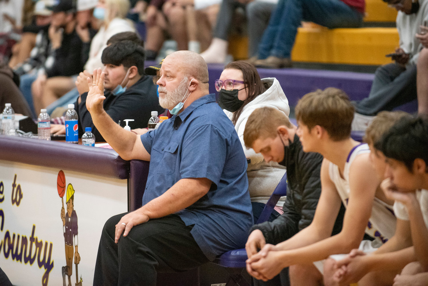 Onalaska coach Wayne Nelson calls a play out from the bench on Dec. 9.