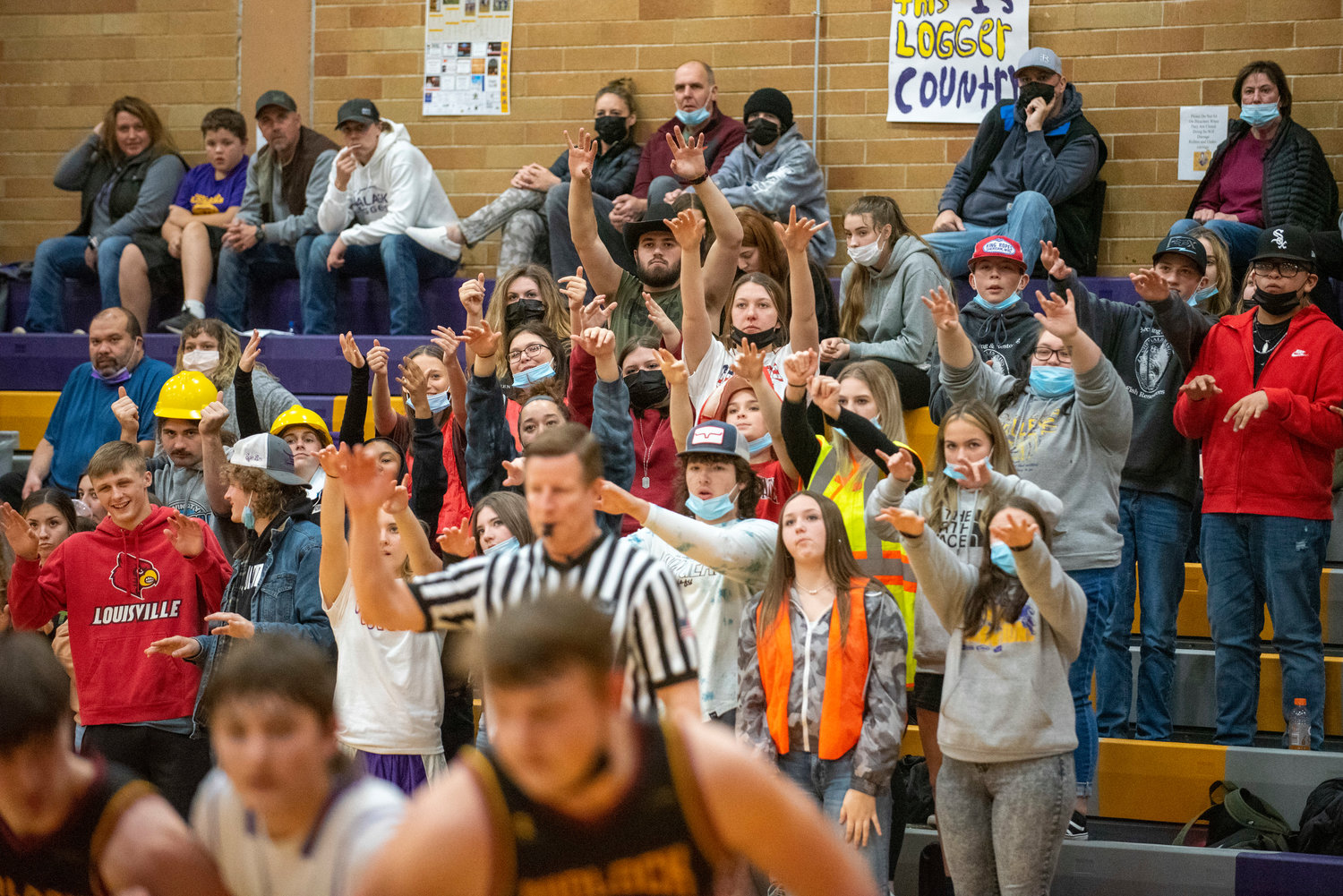 Onalaska's student section throws some jinx on Winlock's foul shooter during a game on Dec. 9.