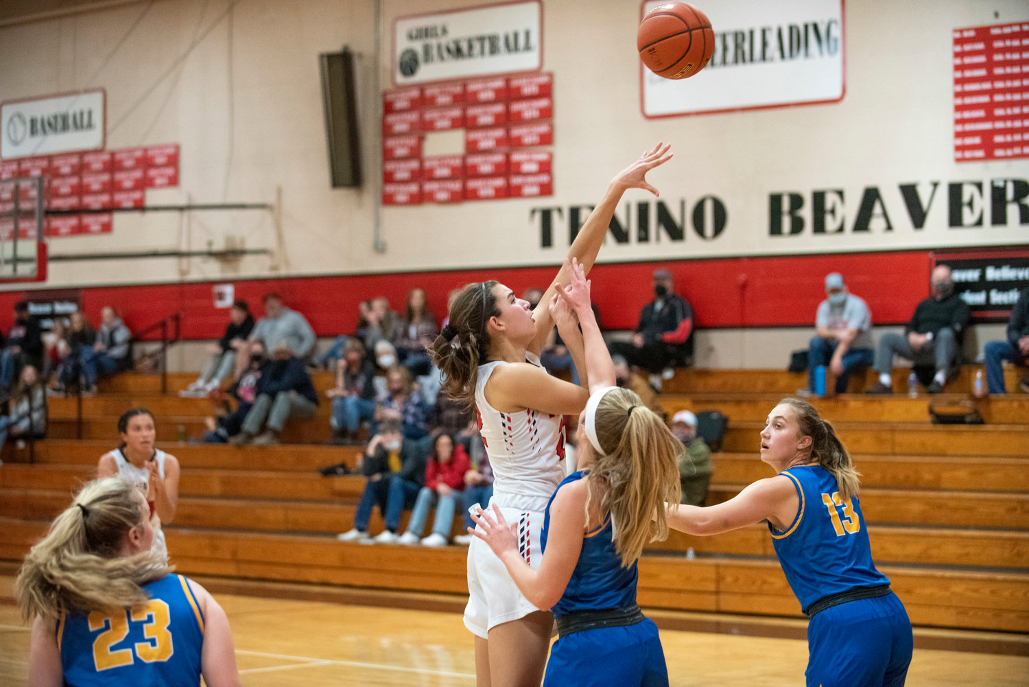 Tenino's Ashley Schow throws up an inside shot against Adna on Dec. 14.