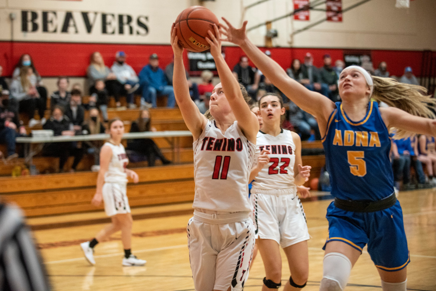 Tenino's Megan Letts (11) receives a pass just out of reach of Adna's Kaylin Todd (5) on Dec. 14.