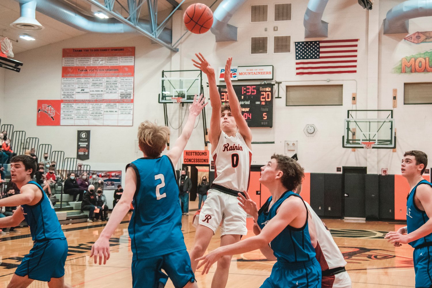 Rainier’s Ian Sprouffske (0) shoots over Toutle defenders during a game Thursday night.