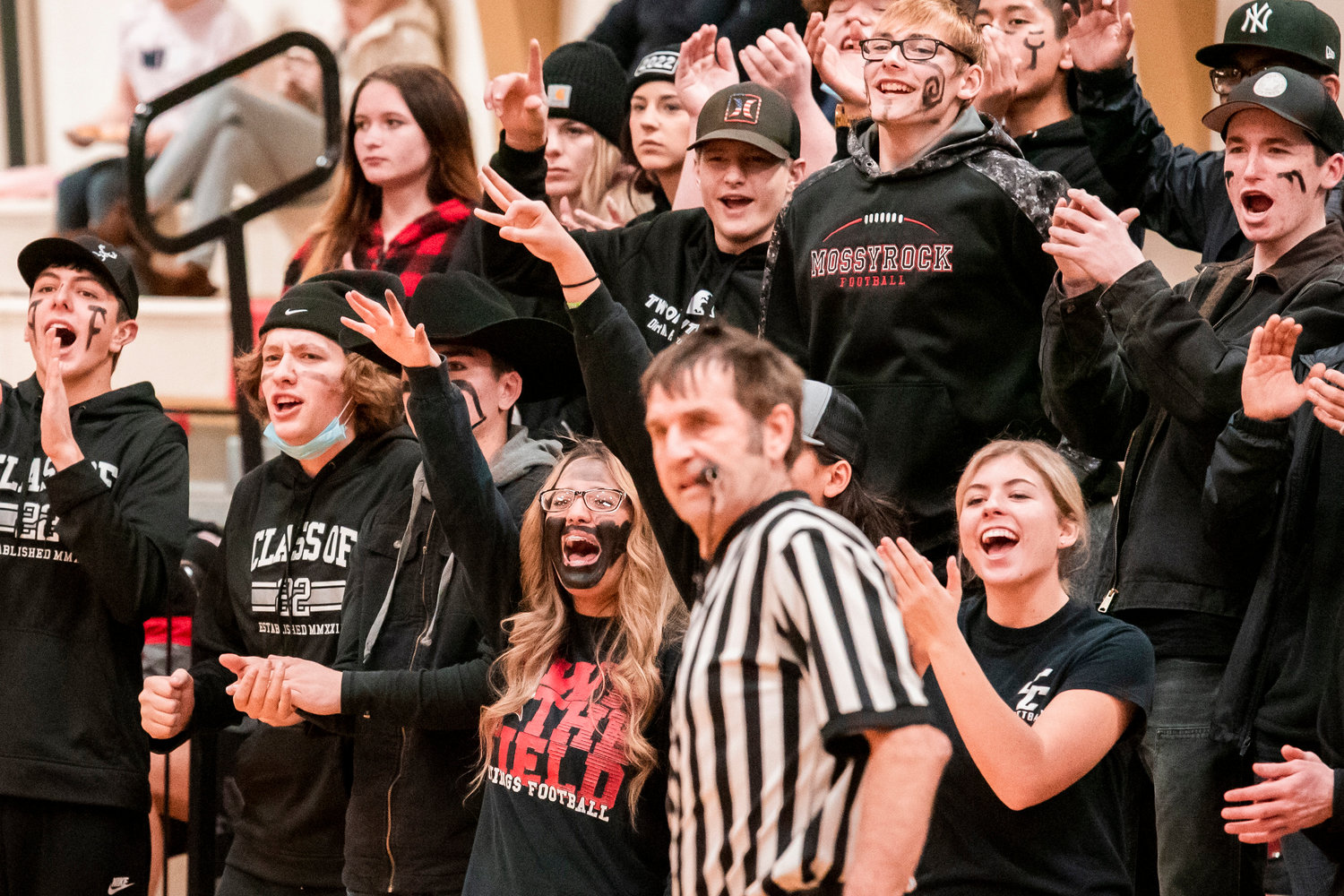 Viking fans celebrate a three-point basket during a game Wednesday night at Mossyrock High School.