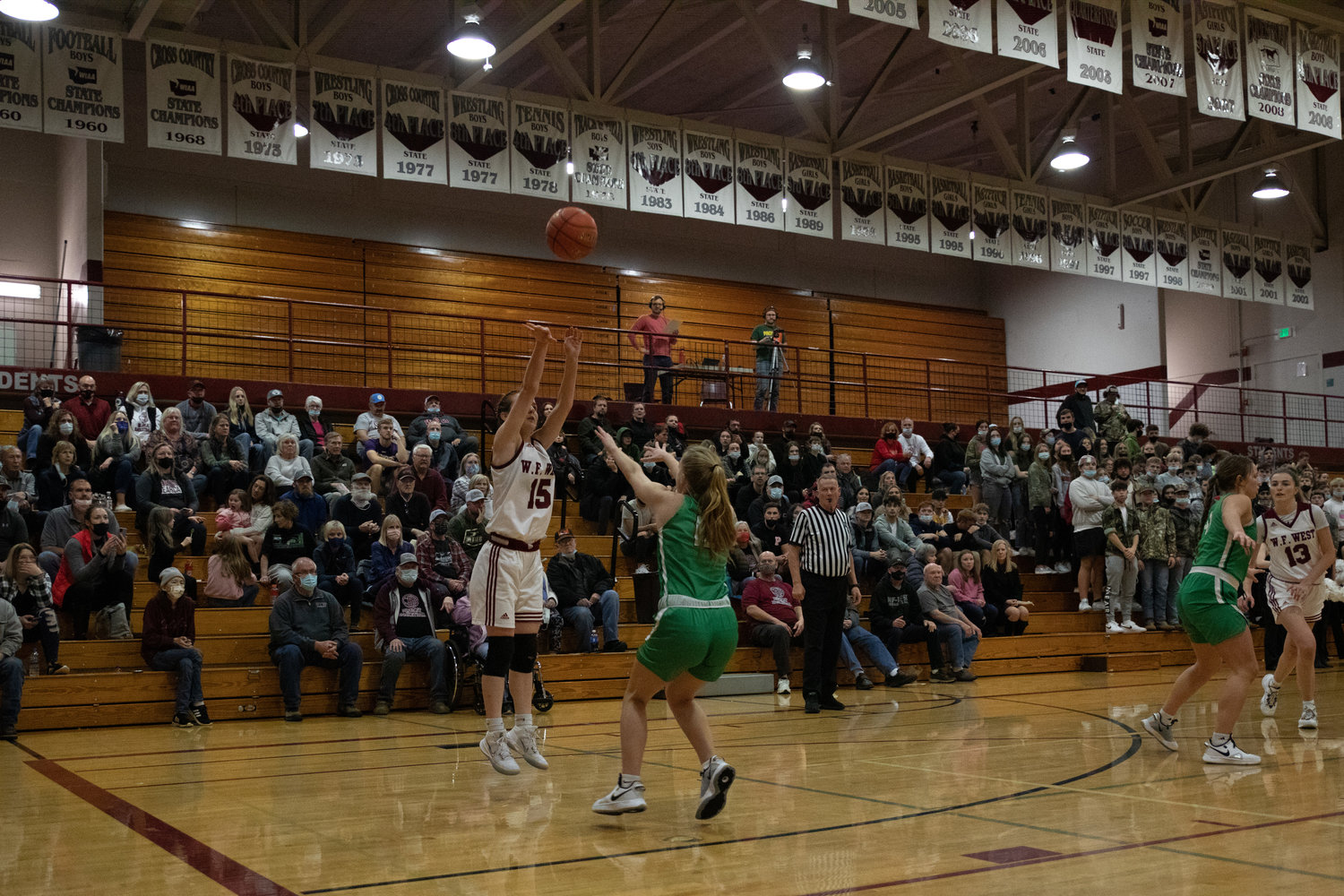 W.F. West guard Amanda Bennett takes a shot as the crowd watches against Tumwater Dec. 17.