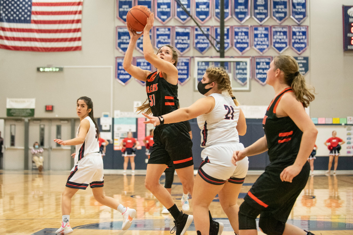 Centralia's Maddie Corwin (31) drives for a shot against Black Hills on Dec. 17.