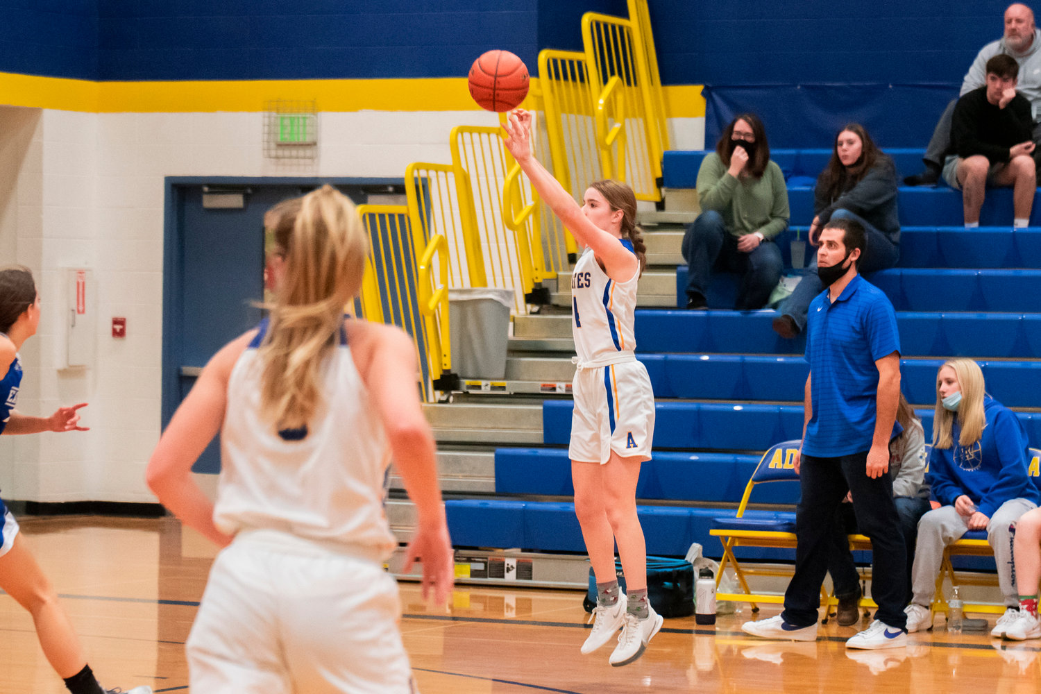 Adna’s Brooklyn Loose (4) shoots a three during a game against Eatonville Friday night.