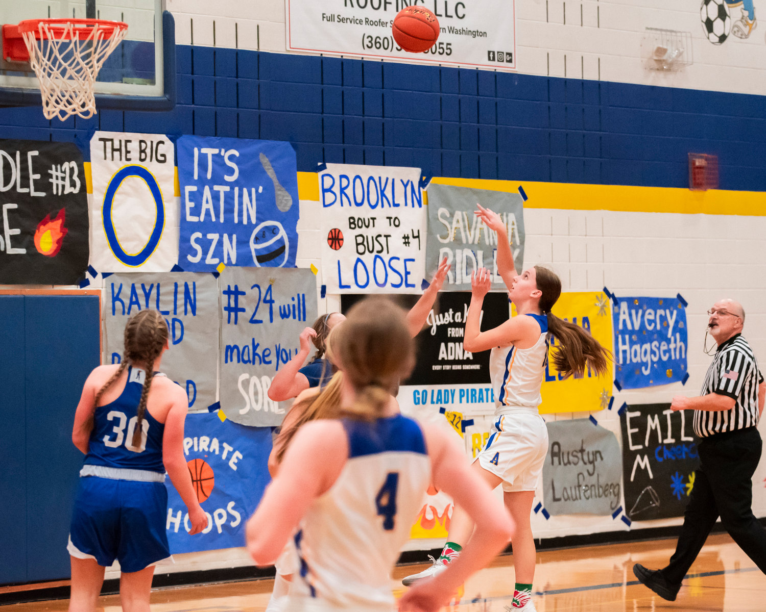 Adna’s Faith Wellander (11) shoots over Eatonville defenders during a game Friday night.