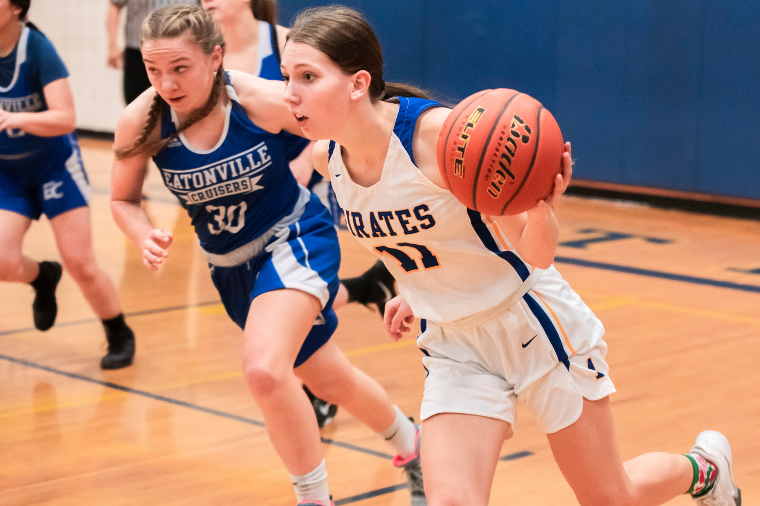 Adna’s Faith Wellander (11) dribbles the ball up the court during a game Friday night.