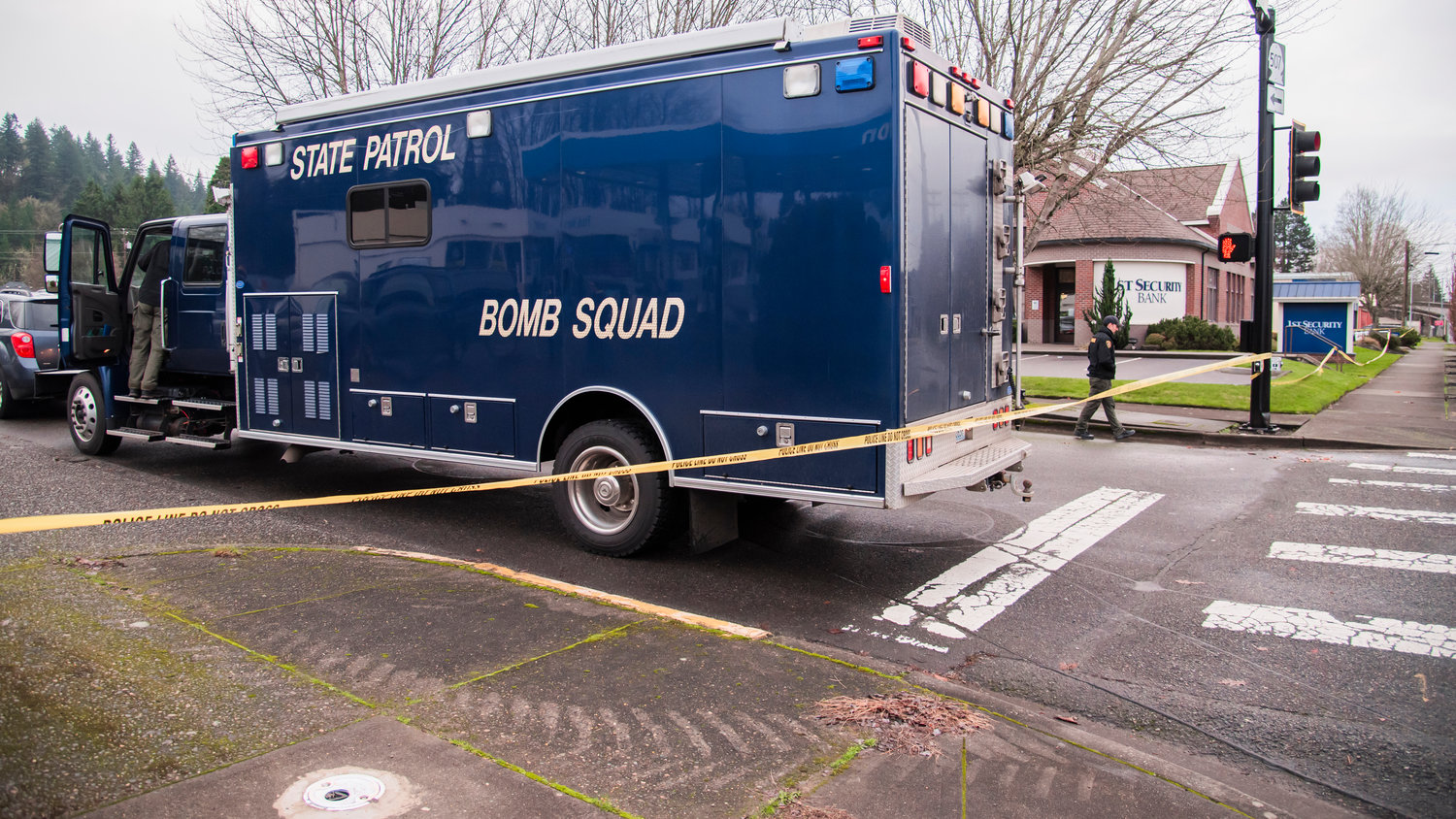 The Washington State Patrol Bomb Squad arrives on the scene at the 1st Security Bank location at 604 South Tower Avenue in Centralia after reports of an explosion in the area last month.